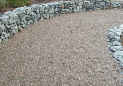 pebble path and stonework Retainer Wall