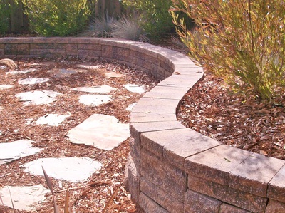 stepping stones and Retainer Wall in a san jose backyard