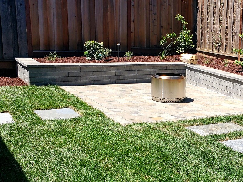 a beautiful interlocking paver stone bench and patio in the bay area