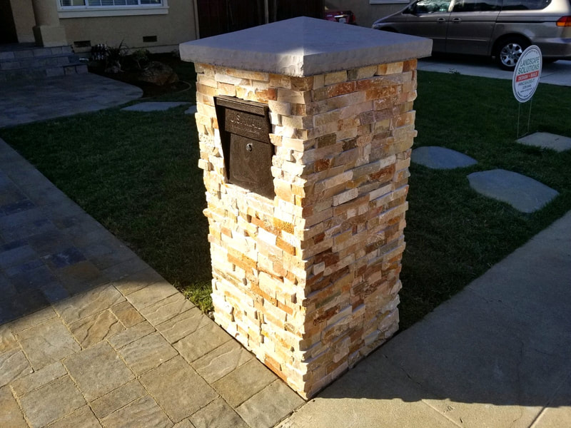Ledgestone mailbox pillar