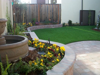 Retainer Wall, water feature and pavers in a san jose backyard